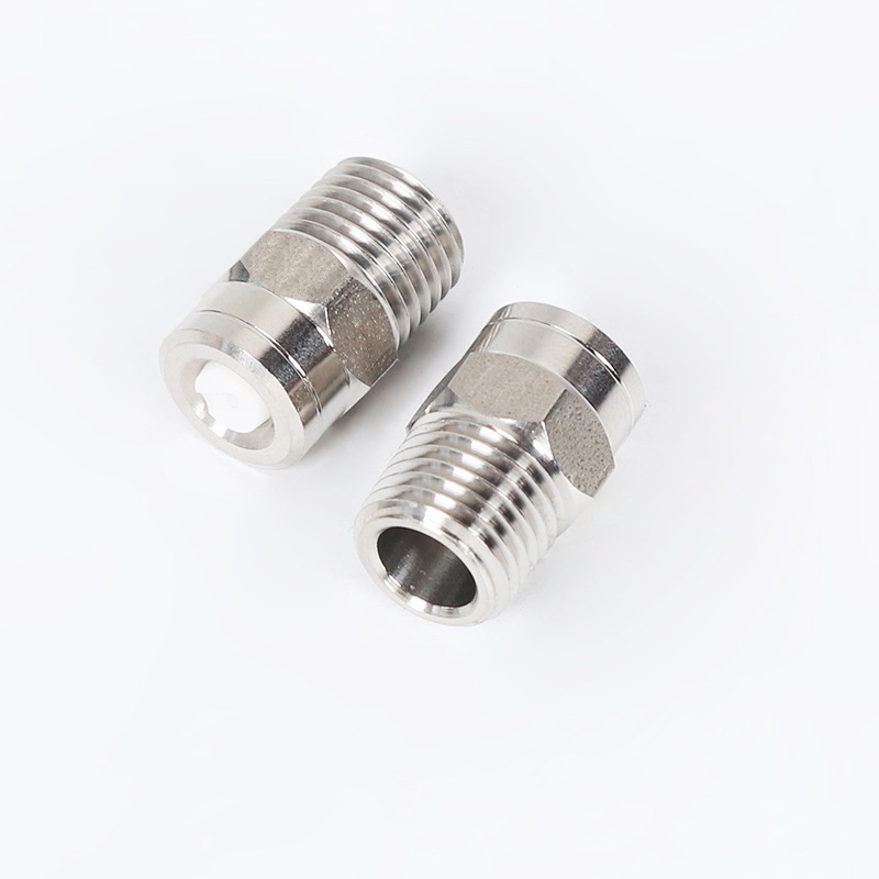 Spyling av støvkjegleomomiseringsdyse